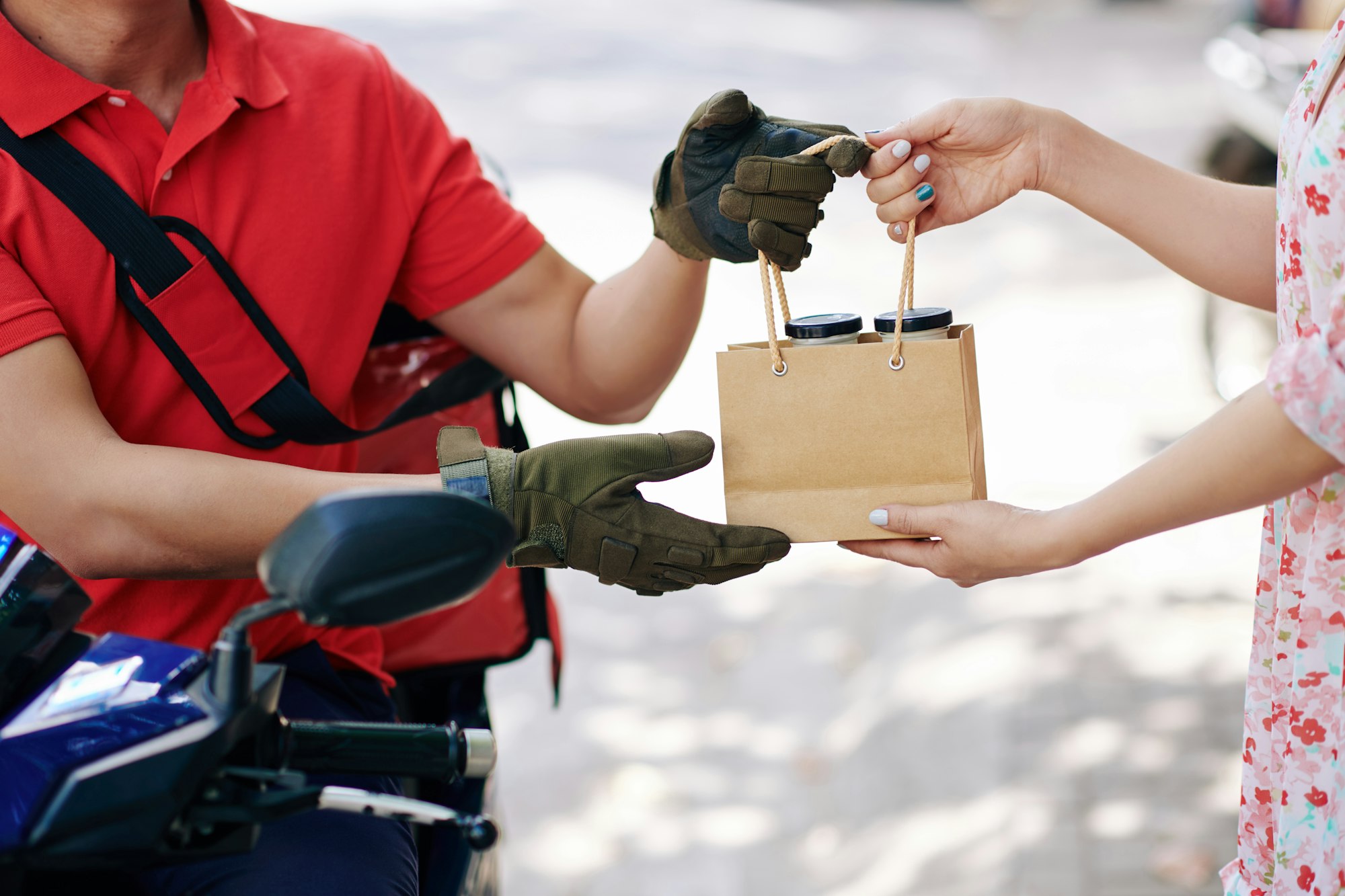 Courier giving order to client